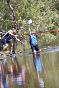 Student on rope bridge in Adventure Race